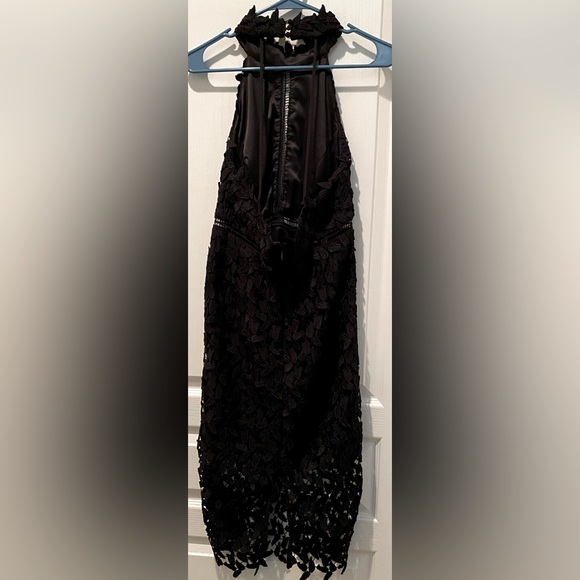 Revolve| Bardot Black Crochet Lace
Gemma Midi Halter Dress - Picture 2 of 8